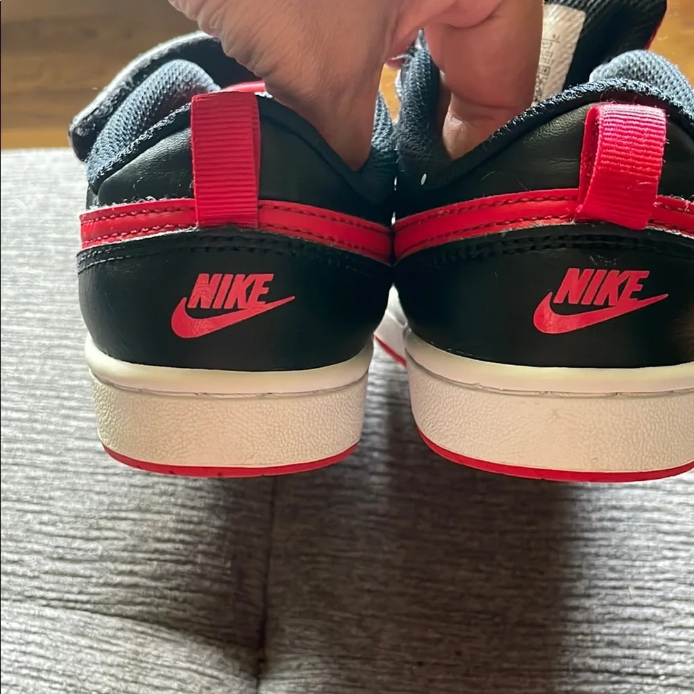 Nike Red and Black Sneakers with Classic Style
